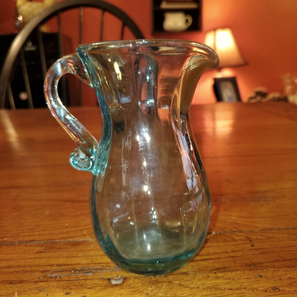 Hand blown glass pitcher